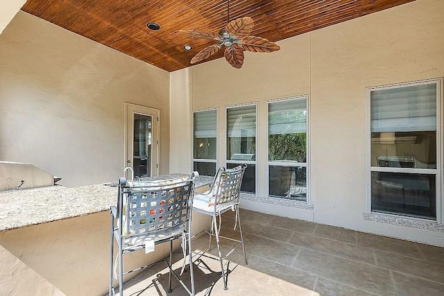 view of patio with ceiling fan