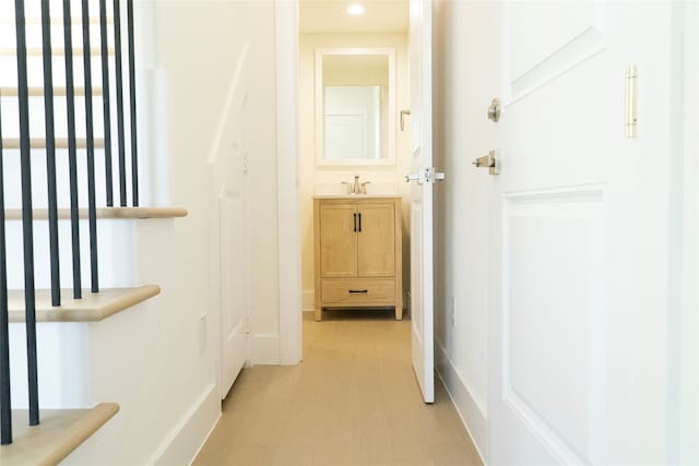 hallway featuring sink