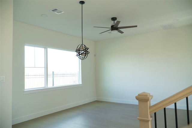 unfurnished room with ceiling fan and light wood-type flooring