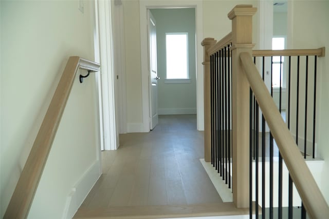 corridor featuring light wood-type flooring