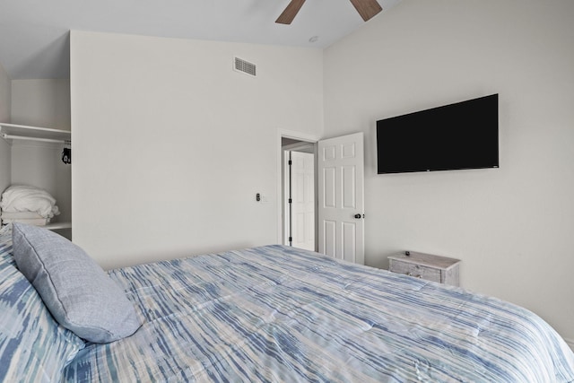 bedroom with ceiling fan and lofted ceiling