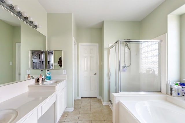 bathroom with tile patterned floors, vanity, and plus walk in shower