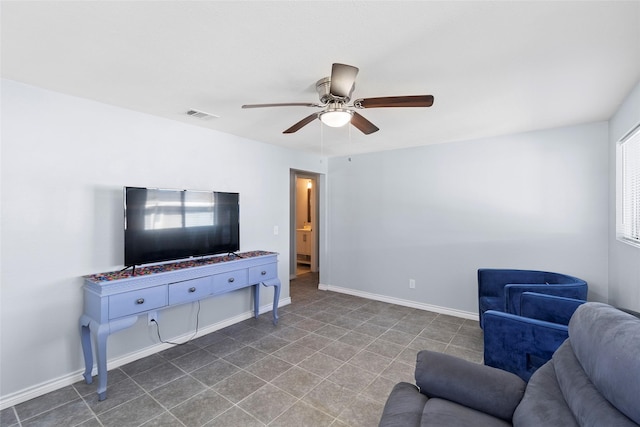 living room featuring ceiling fan