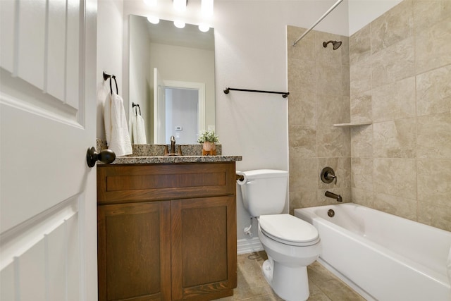 full bathroom with vanity, tile patterned floors, toilet, and tiled shower / bath