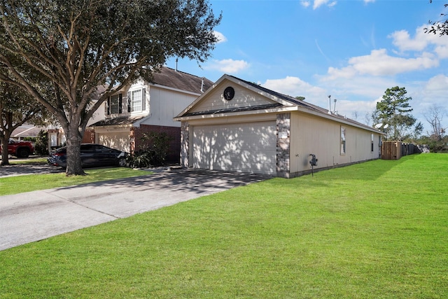 view of property exterior with a lawn and a garage