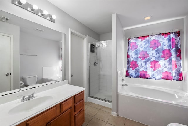 full bathroom featuring tile patterned floors, toilet, vanity, and shower with separate bathtub