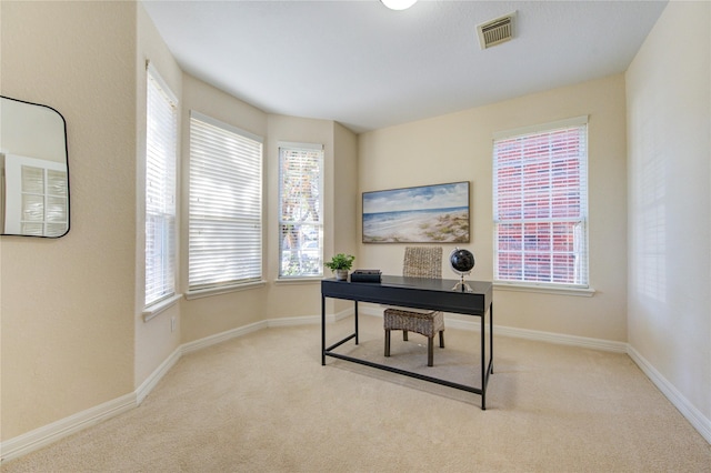 view of carpeted office space