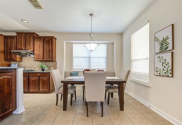 view of tiled dining room