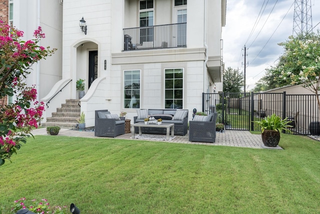 exterior space with outdoor lounge area, a yard, and a patio area