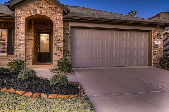 view of front of home featuring a garage