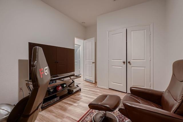 sitting room with light hardwood / wood-style flooring