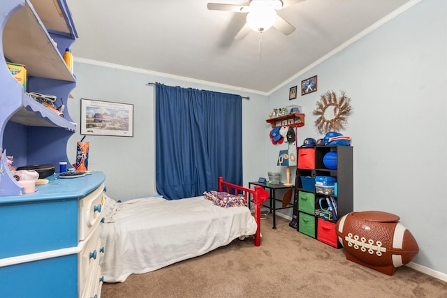 carpeted bedroom with ceiling fan, lofted ceiling, and crown molding