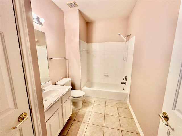 bathroom featuring visible vents, toilet, tile patterned floors, tub / shower combination, and vanity