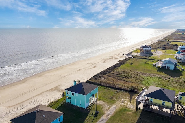 drone / aerial view with a view of the beach and a water view