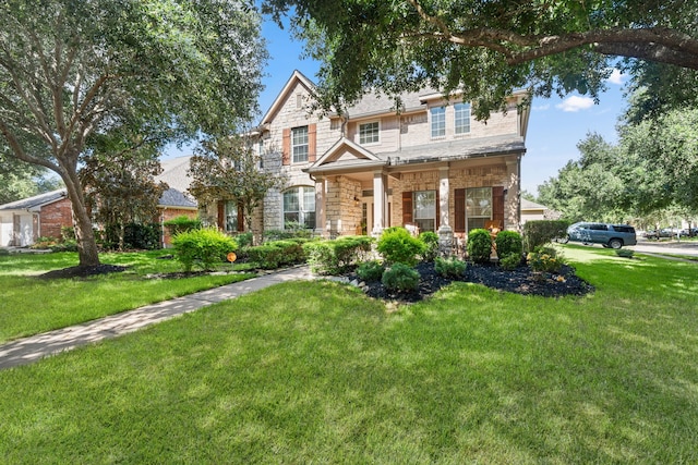 view of front of home featuring a front lawn