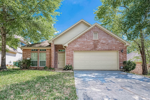 view of front property with a front yard and a garage