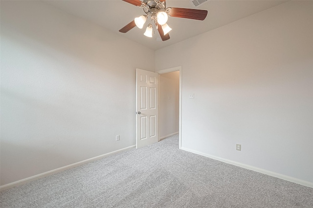 unfurnished room with carpet flooring and ceiling fan