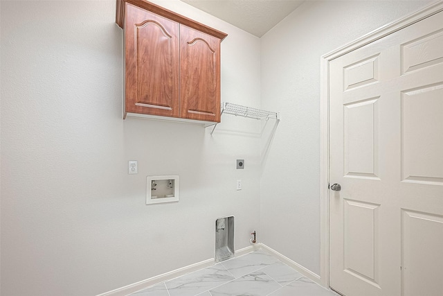 laundry area with electric dryer hookup, cabinets, gas dryer hookup, and hookup for a washing machine