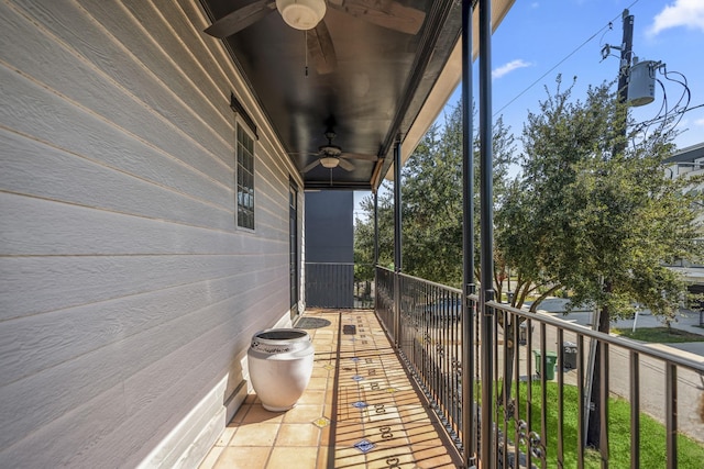 balcony featuring ceiling fan