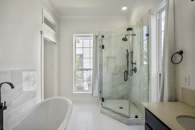 bathroom with vanity, separate shower and tub, a healthy amount of sunlight, and crown molding