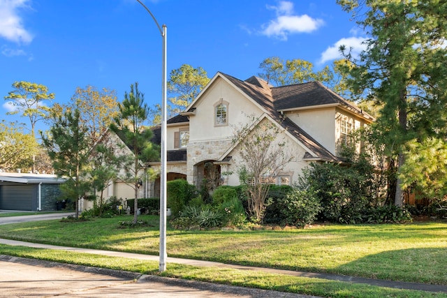 view of front of house with a front lawn