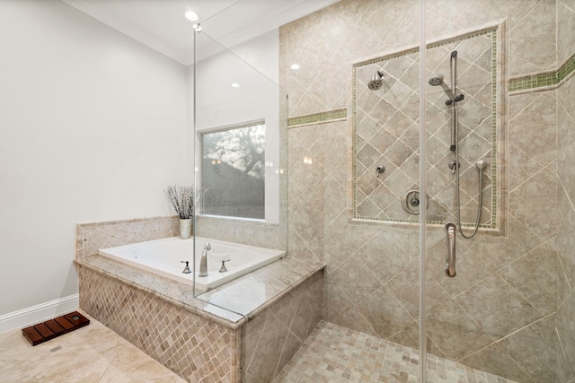 bathroom with shower with separate bathtub