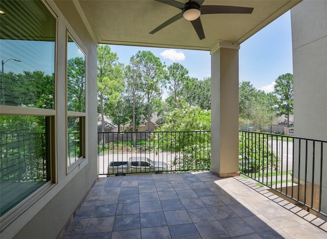 balcony featuring ceiling fan