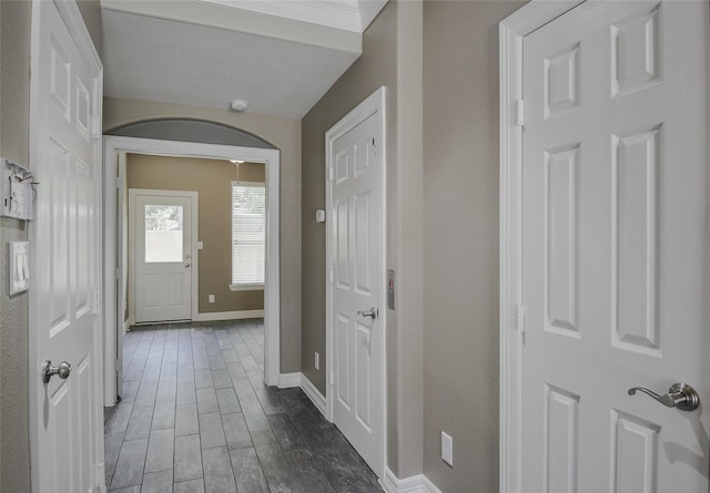 hall with dark hardwood / wood-style floors