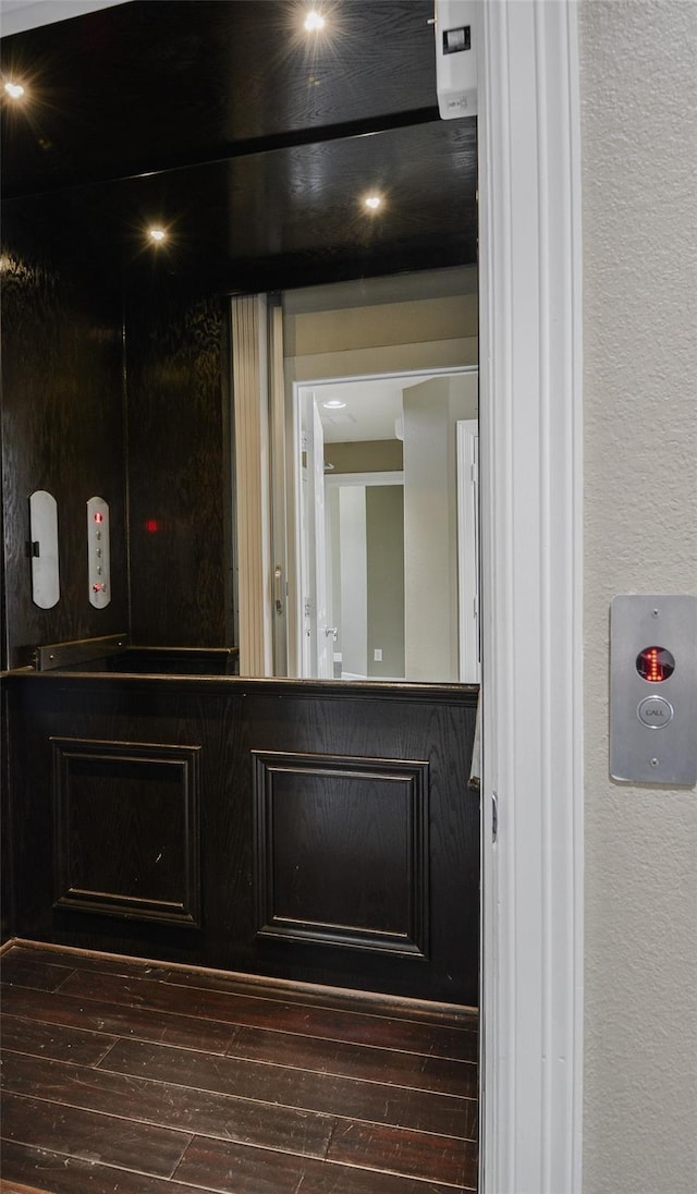 interior details featuring hardwood / wood-style flooring