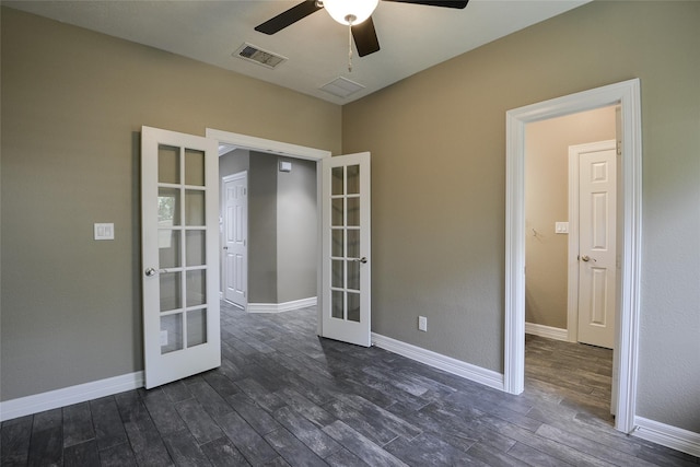 unfurnished room with dark hardwood / wood-style floors, ceiling fan, and french doors