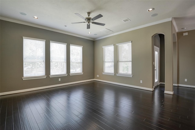 empty room with crown molding, ceiling fan, and a healthy amount of sunlight