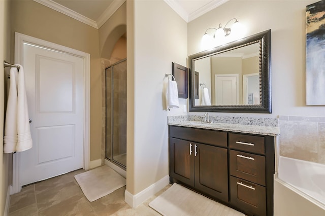 bathroom featuring tile patterned floors, vanity, crown molding, and walk in shower