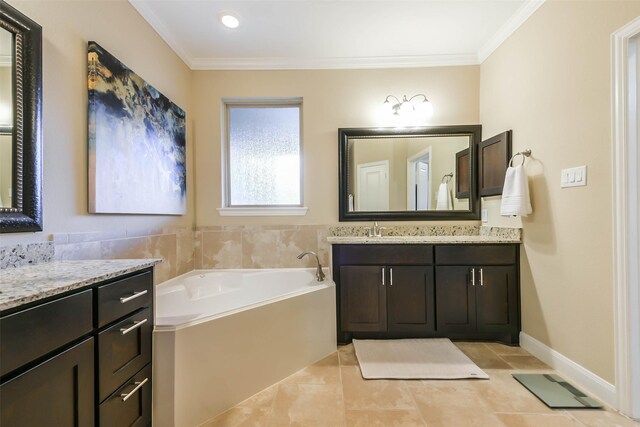 bathroom featuring tile patterned flooring, vanity, a tub to relax in, and ornamental molding