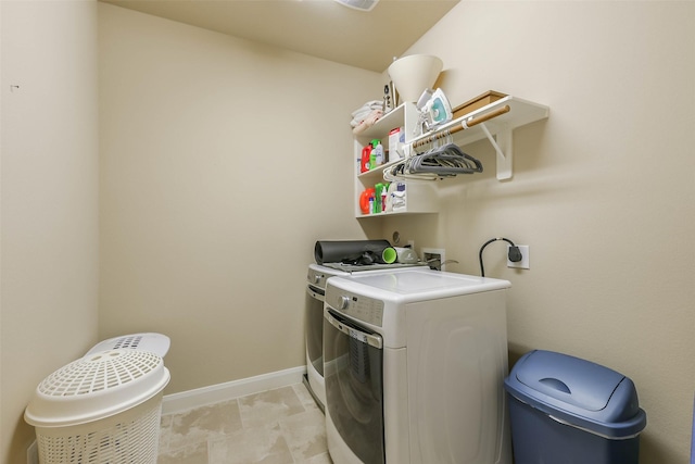 laundry area featuring washing machine and dryer