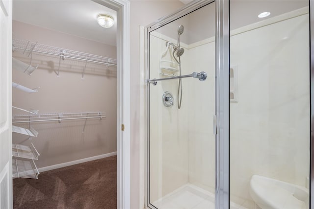 bathroom featuring an enclosed shower