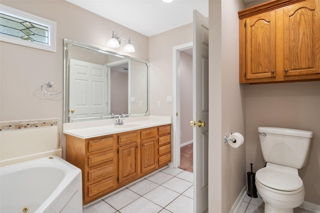 bathroom with tile patterned flooring, vanity, toilet, and a bathing tub