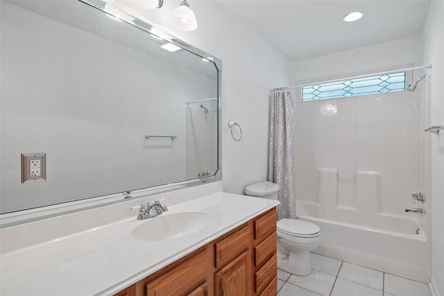 full bathroom featuring toilet, vanity, tile patterned floors, and shower / bath combo with shower curtain