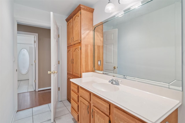 bathroom with vanity and tile patterned flooring