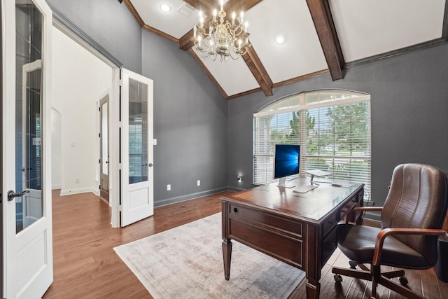 home office featuring a chandelier, french doors, lofted ceiling with beams, and wood-type flooring