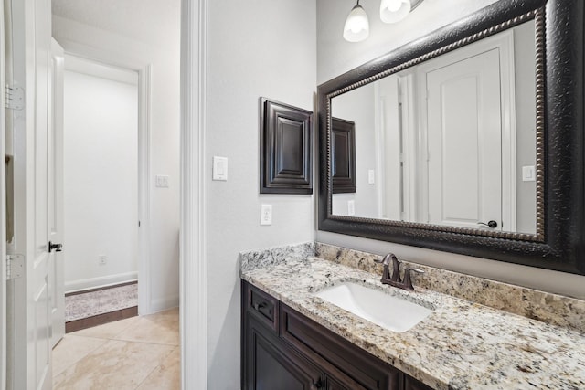 bathroom featuring tile patterned floors and vanity