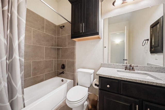 full bathroom featuring vanity, toilet, and shower / bathtub combination with curtain