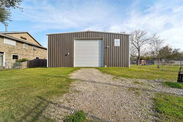 garage featuring a yard