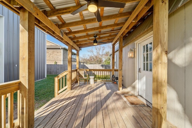 wooden deck featuring ceiling fan