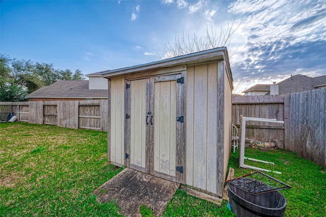 view of outdoor structure with a lawn