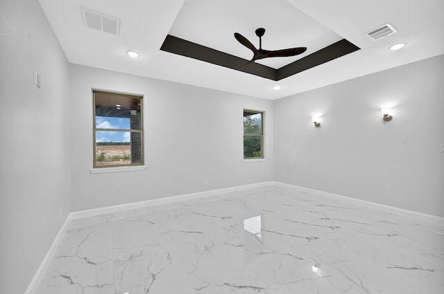 unfurnished room with ceiling fan