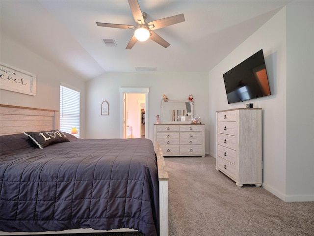 bedroom featuring light carpet, vaulted ceiling, and ceiling fan