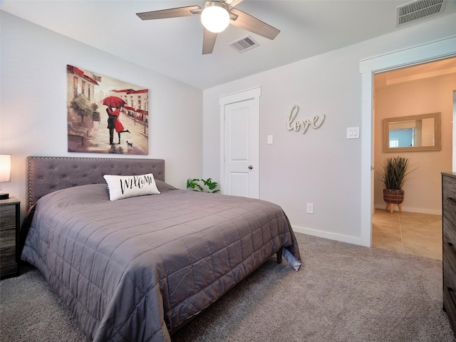 bedroom with ceiling fan and carpet