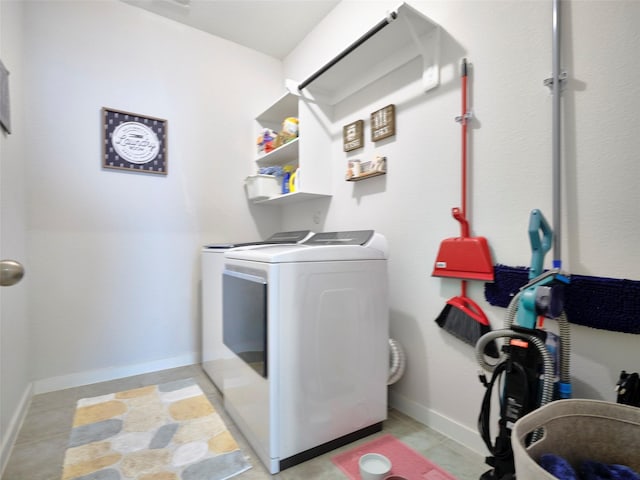 laundry room featuring separate washer and dryer