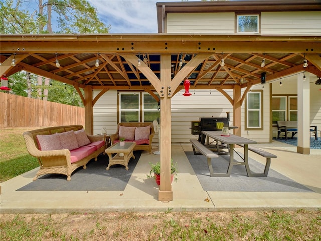 view of patio featuring a gazebo and outdoor lounge area