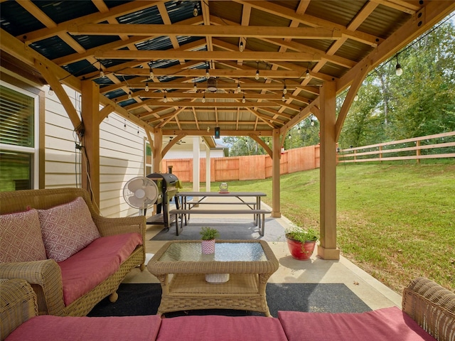 view of patio featuring a gazebo, outdoor lounge area, and grilling area